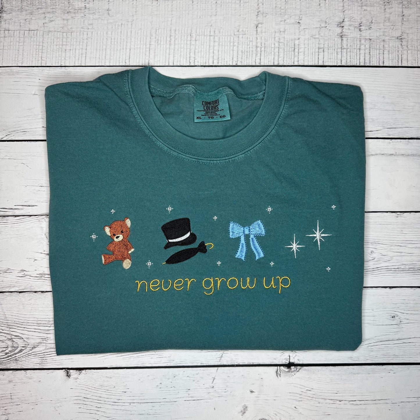 Never Grow Up Tee