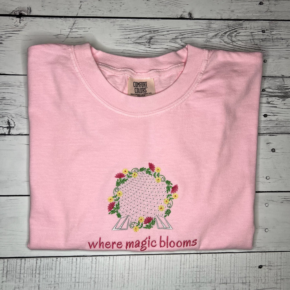 
                      
                        Where Magic Blooms Tee
                      
                    