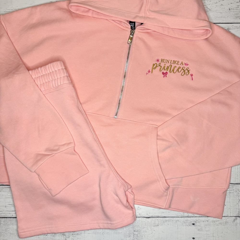 
                      
                        Run like a Princess Quarter Zip Crop
                      
                    