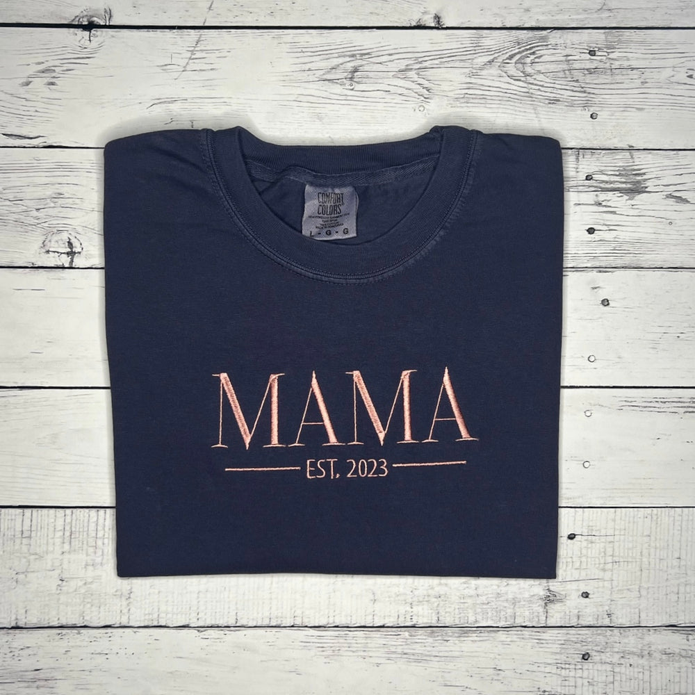 
                      
                        Mama Tee
                      
                    